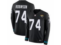 Youth Nike Jacksonville Jaguars #74 Cam Robinson Limited Black Therma Long Sleeve NFL Jersey